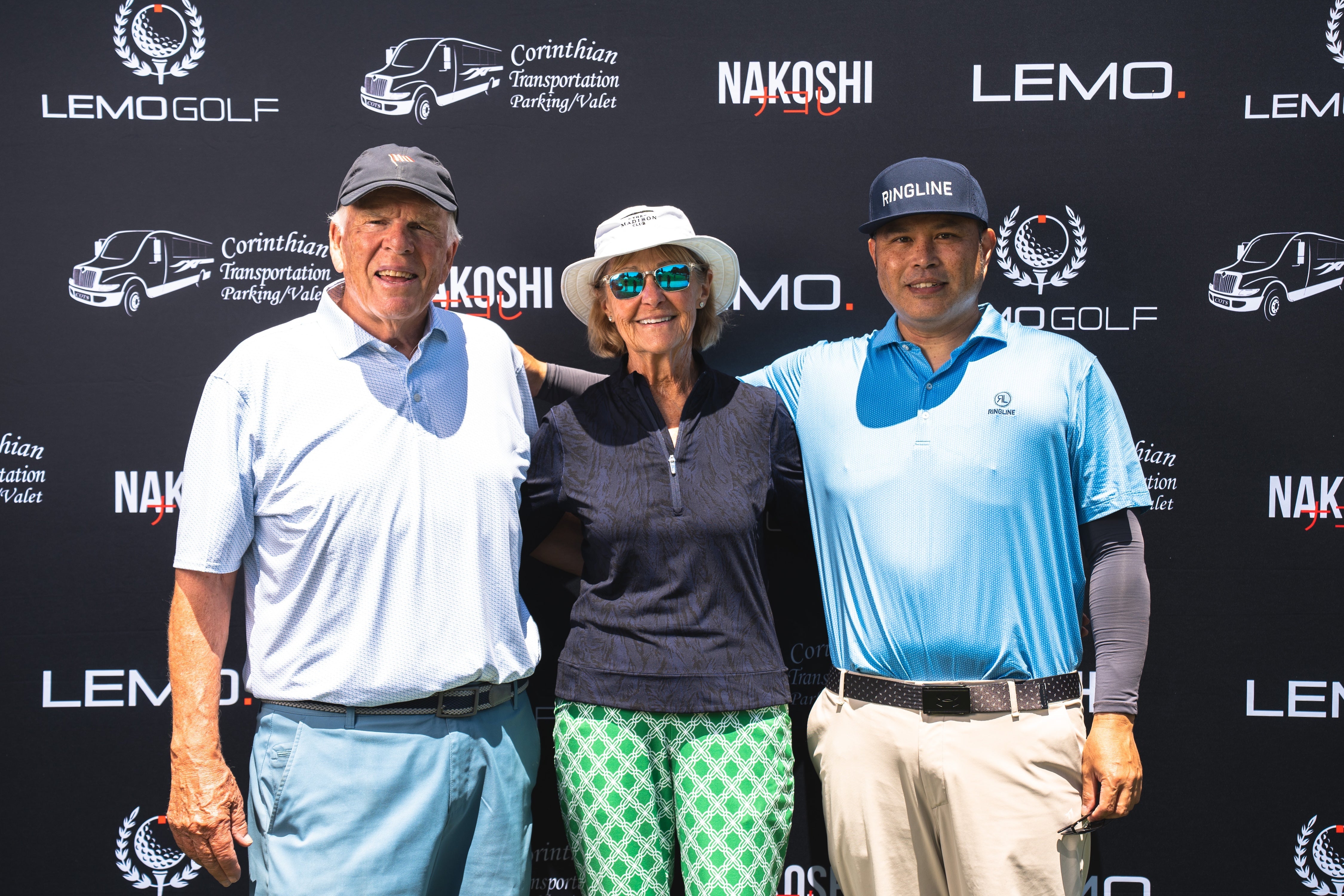 Event photography with Nakoshi sponsor backdrop